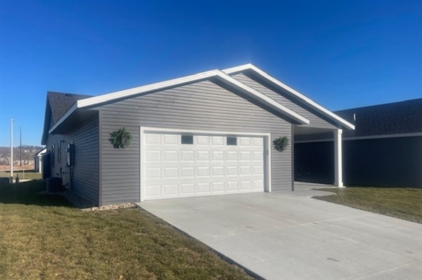 How Does a Garage Door System Work From Opener to Springs and Tracks?