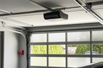 How Do Garage Door Tracks and Rollers Affect Long-Term Operation?
